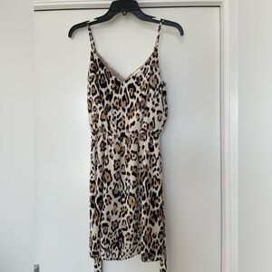 socialite leopard/ animal print v neck dress 
xs / nwt